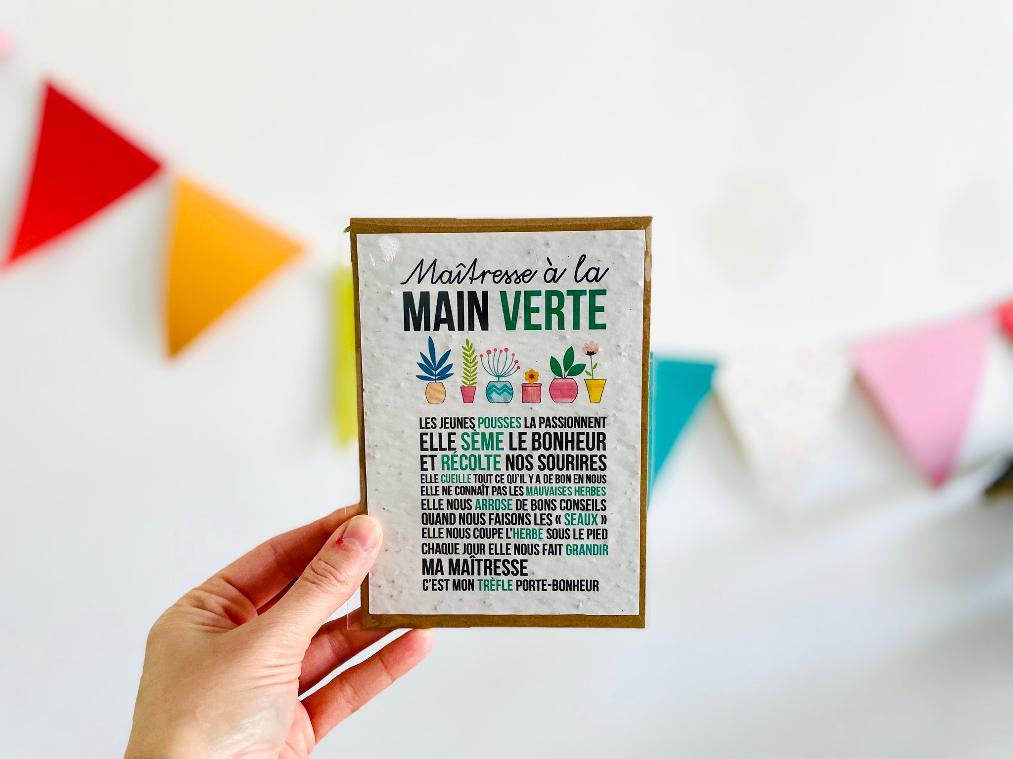 Carte à planter maîtresse à la main verte